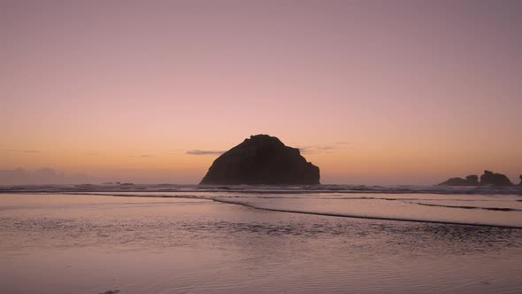 Face Rock in Bandon, Oregon, United States during sunset. This formation is famous for the facial pr