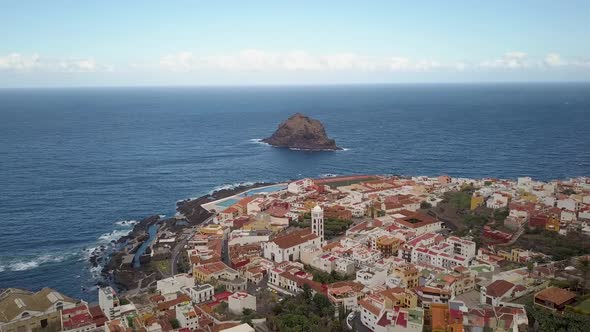 Overview of Garachico,Tenerife, from above. Roque de Garachico in the background. Camera ising from