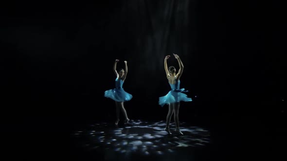 Young Dancers Twirl in Sync