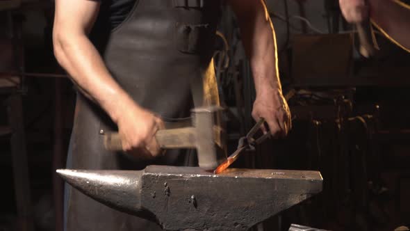 Treatment of Molten Metal Close-up. Handmade Blacksmith