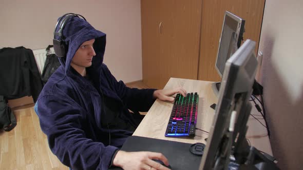 Man Playing On The Computer