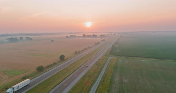 Beautiful Sunrise Nature Landscape with Meadow in the Morning Fog