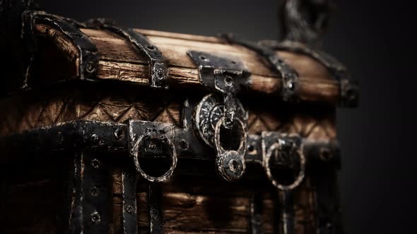Closed Wooden Treasure Chest with Metal Clasp alt