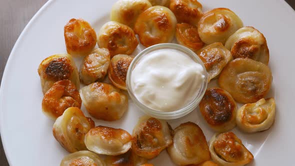 Roasted Dumplings with a Cream Sauce