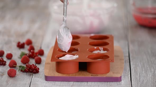 The Process of Making Homemade Ice Cream with Berries.