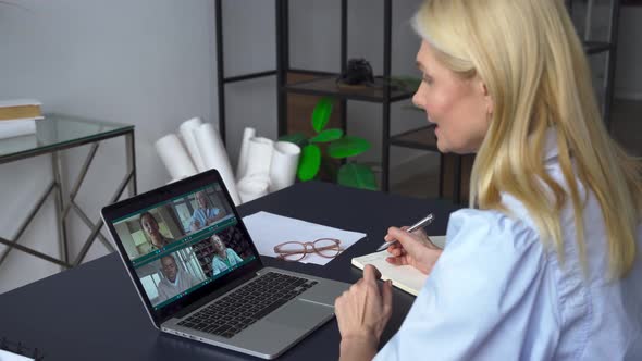 Business Woman Having Virtual Team Meeting on Video Conference Call