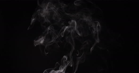 Effect of smoke fading away with a wave effect on a background. VFX Video Element