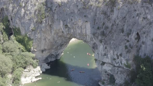 Ungraded Aerial view of Narural arch in Vallon Pont D'arc in Ardeche canyon in France