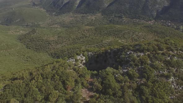 Aerial view: mysterious Fairy garden Neraidokipos on mount Gouvala in Greece