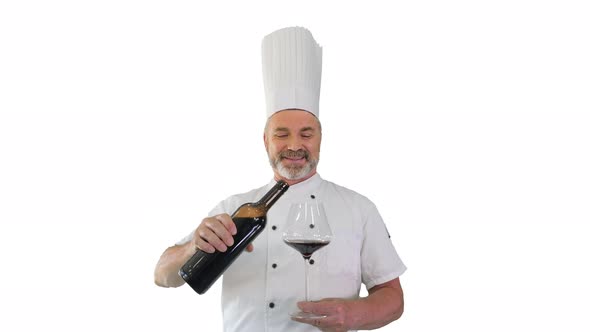 Chef Tasting Red Wine and Enjoying It on White Background