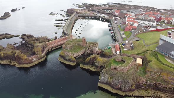 Amazing aerial view of ruined Dunbar Castle, Scotland