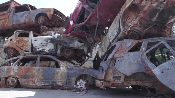 War in Ukraine a Dump of Shot and Burned Cars in Irpin Bucha District