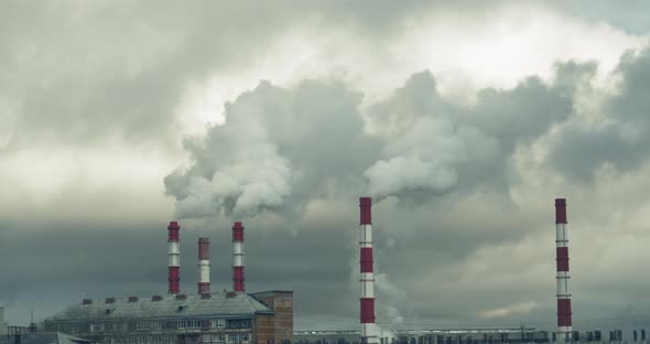 A Smoke Coming Out of the Pipe at Central Electric Heat Plant