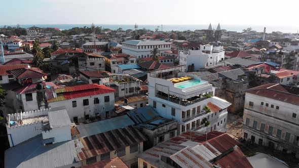 Aerial View of Stone Town Zanzibar City Slum Roofs and Poor Streets Africa