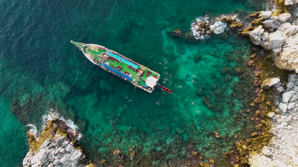 People swim in the azure sea aerial view 4 K Turkey Alanya