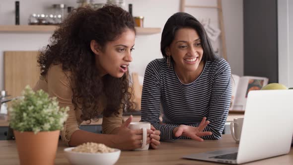 Video of happy women during a video conference at home. Shot with RED helium camera in 8K.