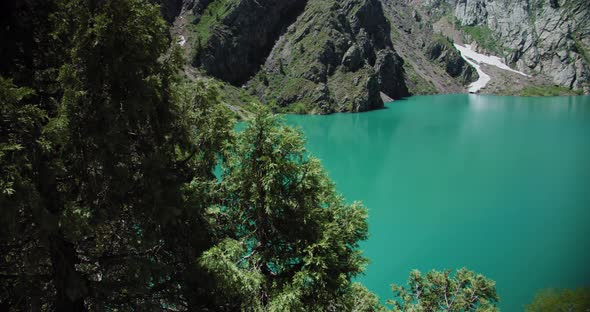 Mountain Lake of green and blue color Urungach. Located in Uzbekistan, Central Asia. 1 out of 10