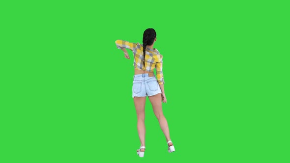 Happy Woman in Jeans Shorts Dancing on a Green Screen, Chroma Key