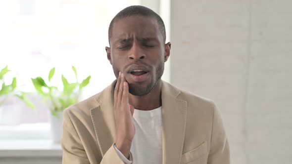 Portrait of Sick African Man Having Toothache