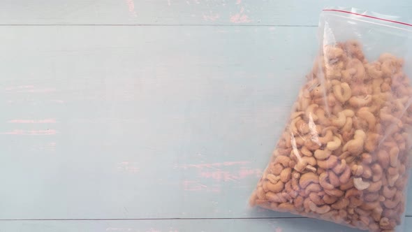 Cashew Nut and Glass of Milk on Table  Flat Lay