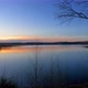 Very Beautiful Horizontal Pan of a Sunset Behind a Calm Lake with Smooth Camera Motion Through the - VideoHive Item for Sale