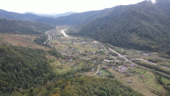 Aerial View of the Village in the Carpathian Mountains in Autumn. Ukraine