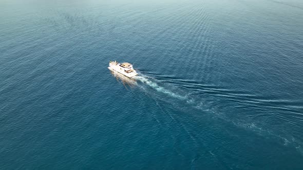 The yacht calls at the port aerial view 4 K