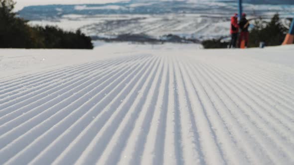 Groomed Snow on a Ski Hill