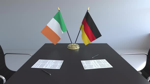 Flags of Ireland and Germany and Papers