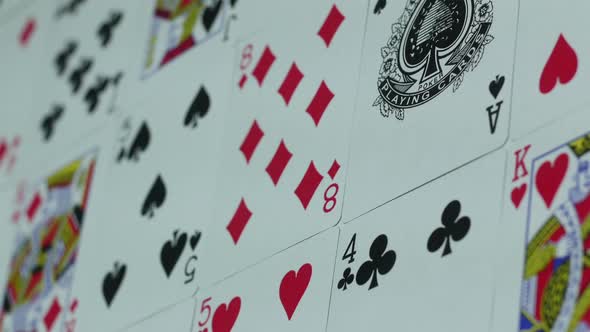 Deck Of Playing Cards Is Spread Out On The Table