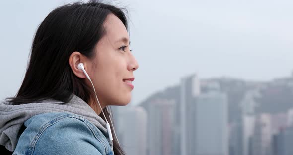 Woman enjoy music at outdoor