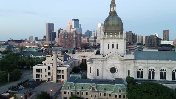 Aerial view of Saint Marys chatedral  with minneapolis skyline in the background during blue hour