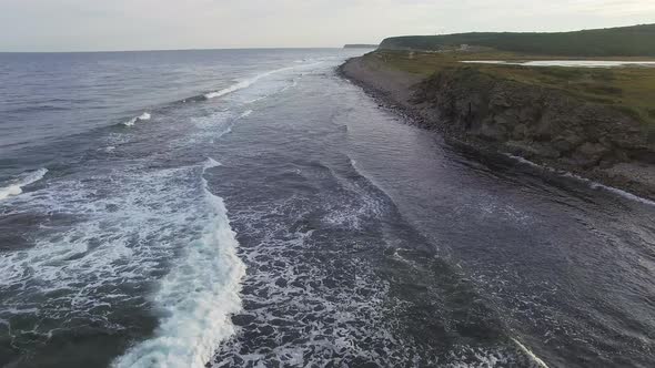 Drone View of the Sea Coast with Rocky Shore and Waves