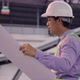 Civil engineer work inspecting architect drawing on construction site. - VideoHive Item for Sale