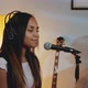 Black Girl in Headphone Singing Into Microphone at the Rehearsal in Home Studio - VideoHive Item for Sale