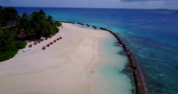 Natural drone tourism shot of a summer white paradise sand beach and aqua turquoise water background