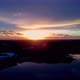 Hovering Over a Large and Big Lake at Sunset - VideoHive Item for Sale