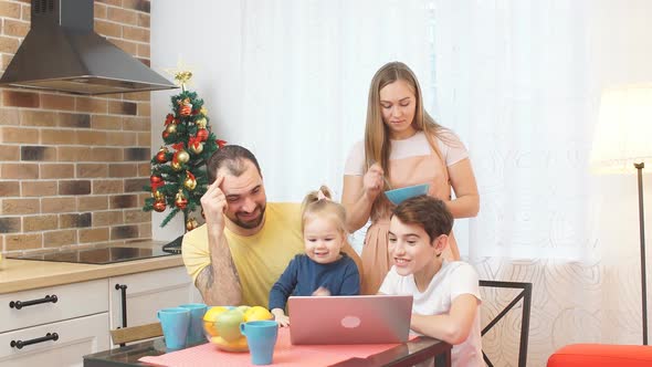 Young and Beautiful Parents Enjoy Spending Time with Kids