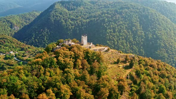 Aerial View of the Old Fortress in Mountains on Sea Coast. Panorama From Height To the Ruins