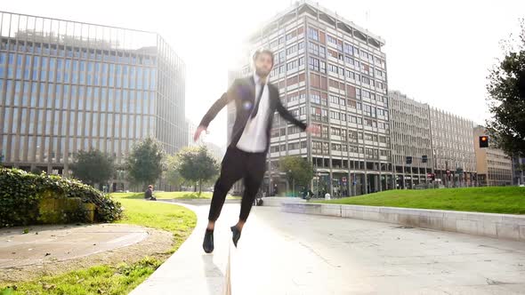 Slow motion of young business man jumping