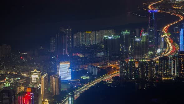 Shenzhen China Urban Cityscape Aerial Skyline Panorama Timelapse at Night Pan Up