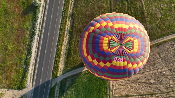 4K Aerial view of Goreme. Colorful hot air balloons fly over the valleys.