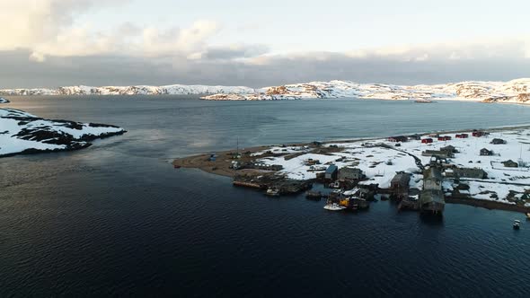 The Drone Flies Low Over a Fishing Village in the Bay of the North Sea