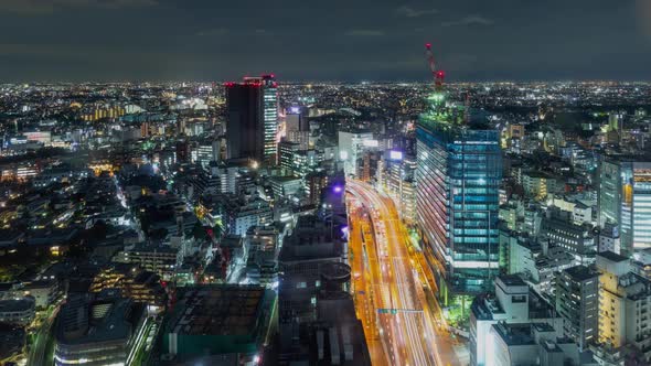 Time Lapse of busy highway and the buildings of Tokyo Japan at night