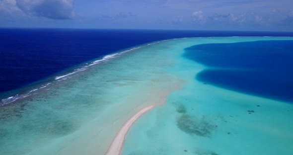 Beautiful flying abstract view of a sunshine white sandy paradise beach and turquoise sea background