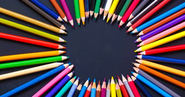 top view stop motion pencil colorful on black background