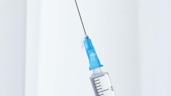 Close Up of Injection Liquid Being in Syringe