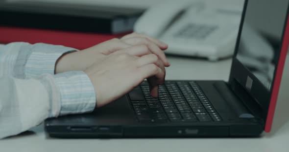 Woman Hands Closeup Tapping on the Keyboard From