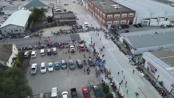Pre-parade festivities in La Crosse, Wisconsin. Many people enjoying the empty streets.