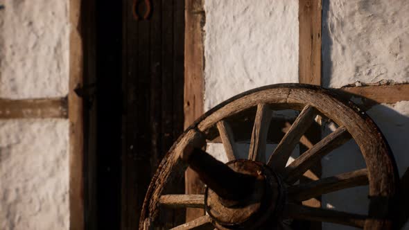 Old Wood Wheel and Black Door at White House